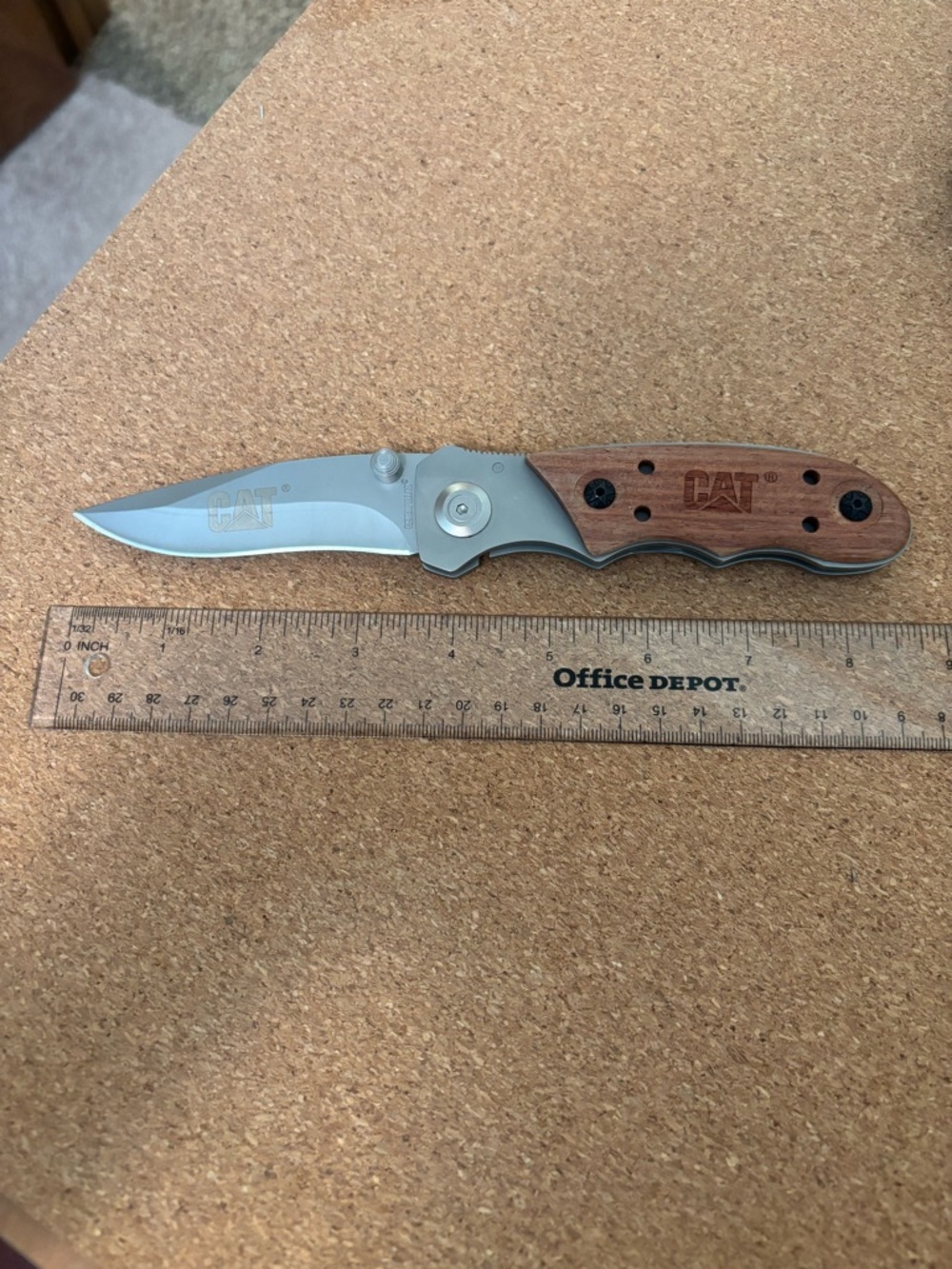 CAT folding knife and sheath